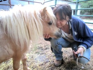 Cindy with Whisper Ranch resident, Pumpkin